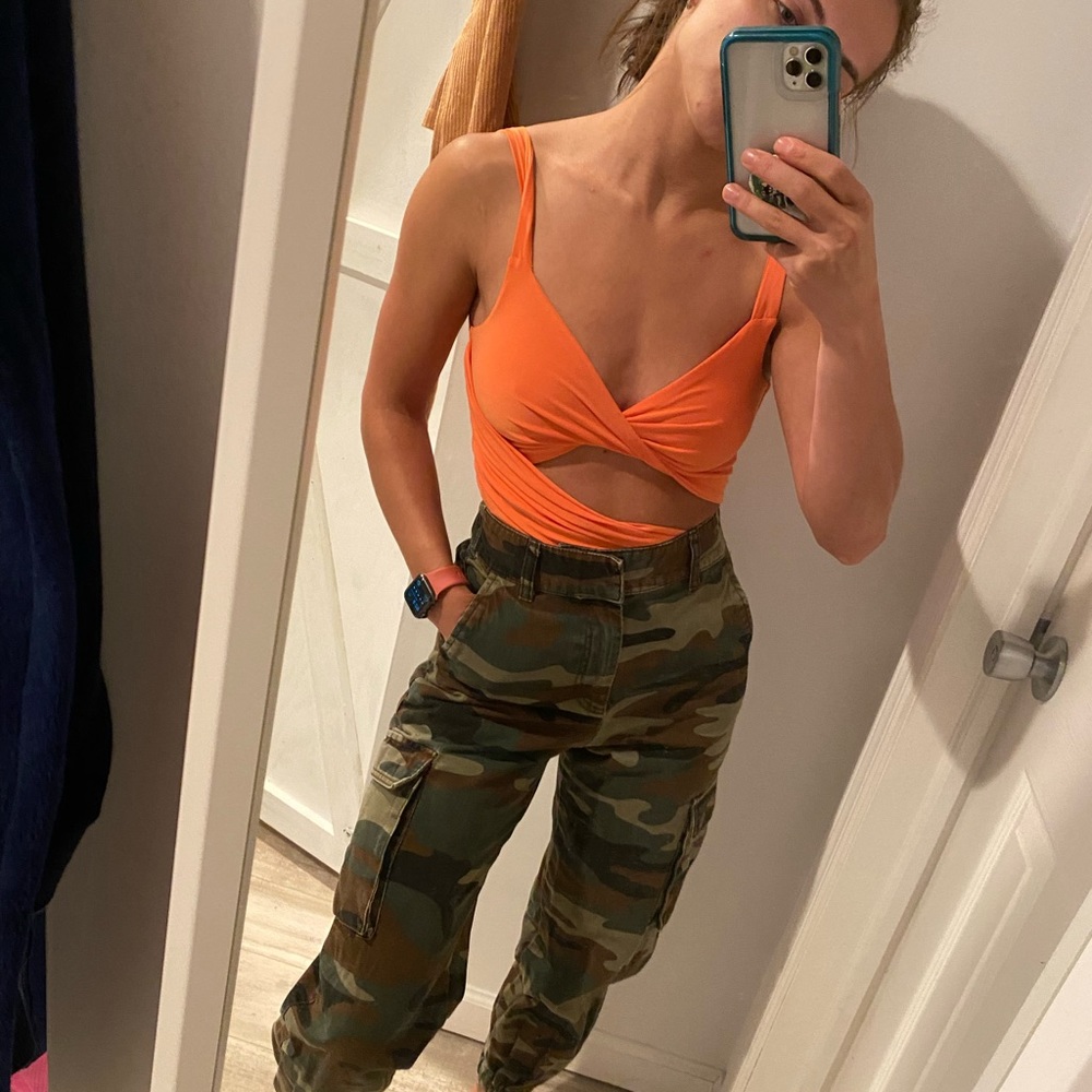 Orange body suit
